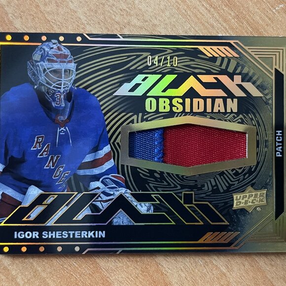 2023-24 UD Black Obsidian Jerseys Patch Gold #OJIS Igor Shesterkin #'d 4/10 - Picture 1 of 2